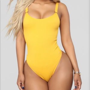 Mustard colored bodysuit from Fashion Nova